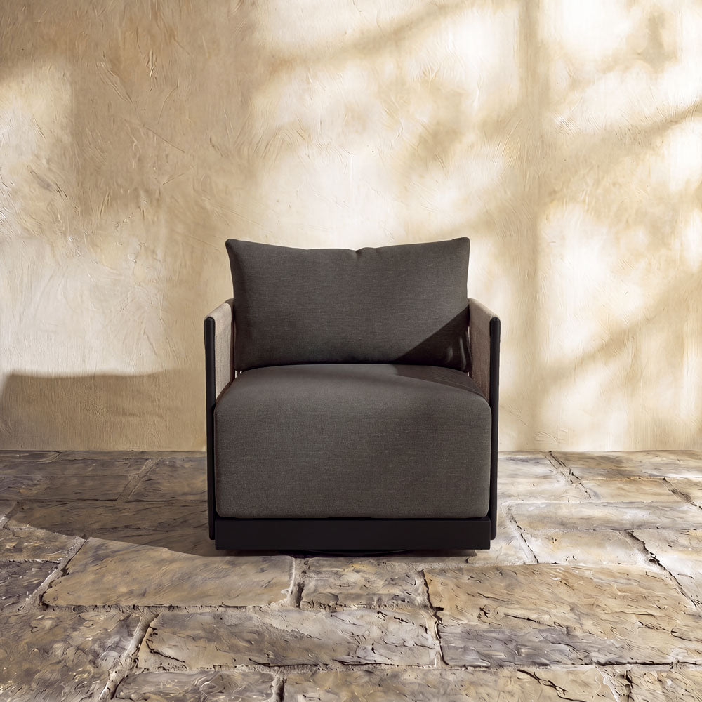 Modern Resort Club Swivel Chair featuring a black metal frame and deep charcoal outdoor upholstery.