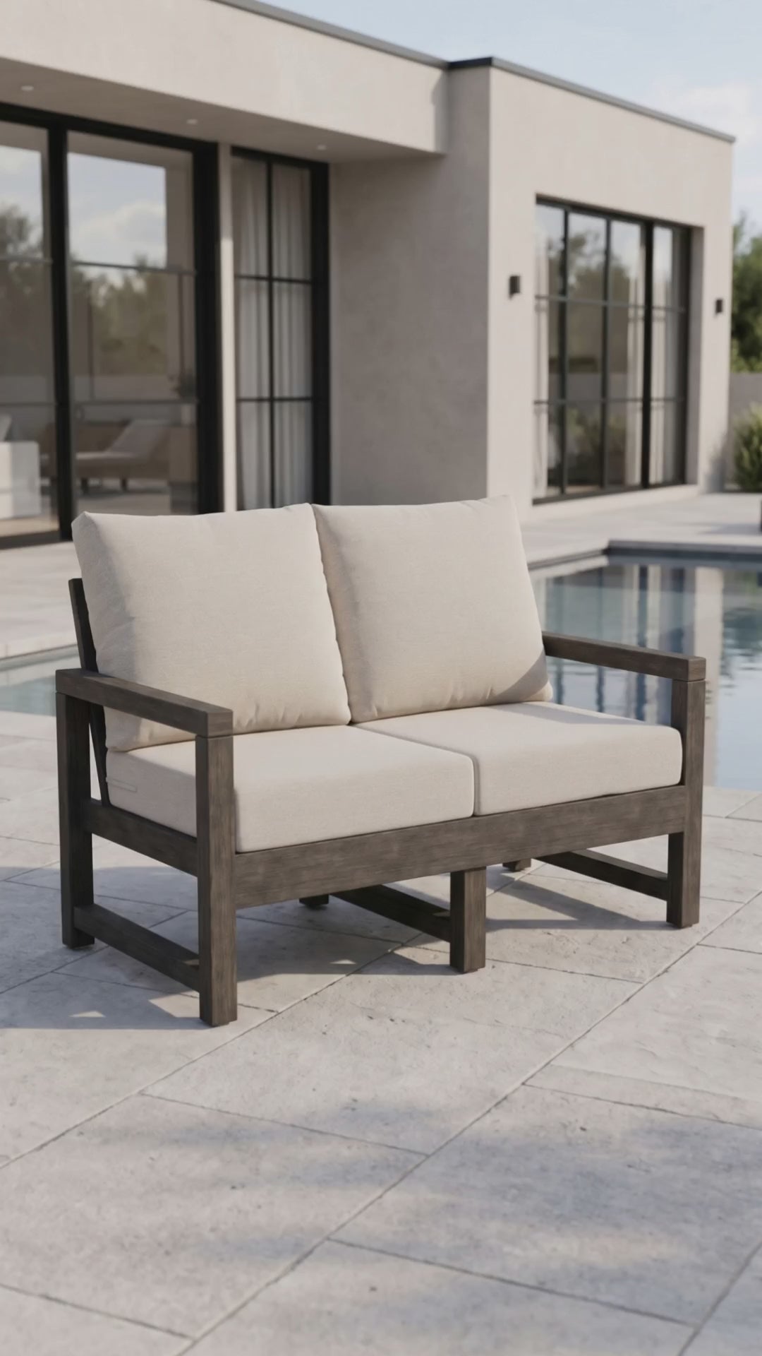 Paddy O' Furniture Lakeside Loveseat with Bliss cushions for luxury outdoor relaxation.
