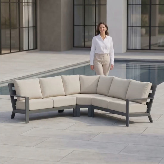 Paddy O' Furniture Peninsula 6-seat sectional patio set featuring Bliss cushions for outdoor relaxation.
