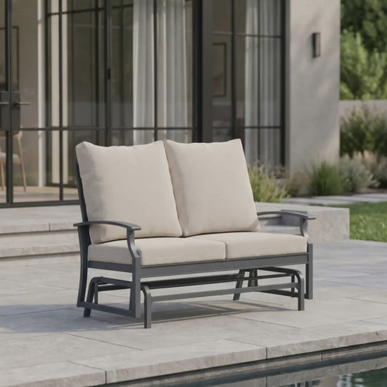 Paddy O' Furniture Rockport outdoor double glider with plush Bliss cushions in a serene outdoor setting