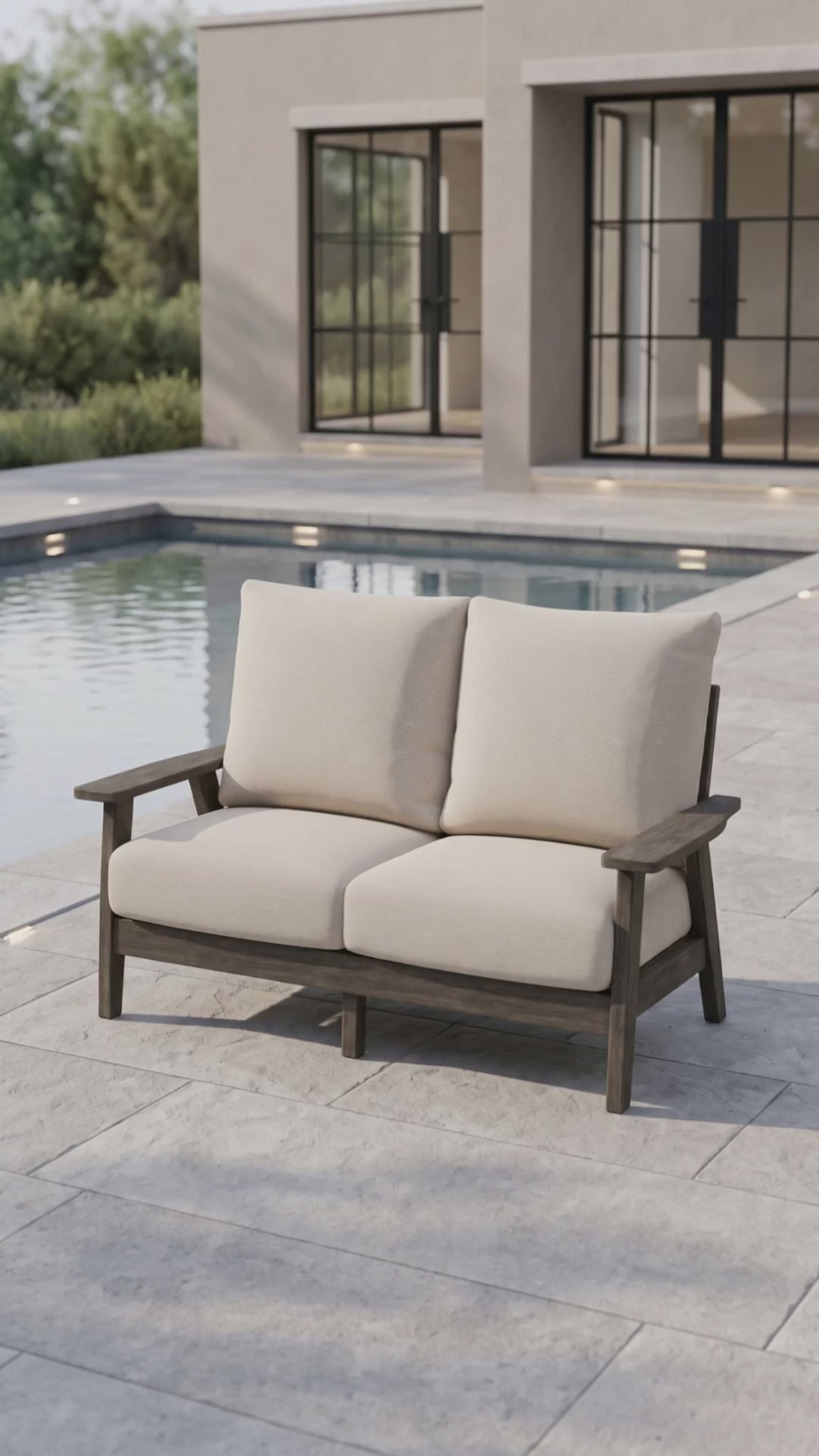 Patriot Loveseat by Paddy O' Furniture featuring deep Bliss cushions for outdoor relaxation.
