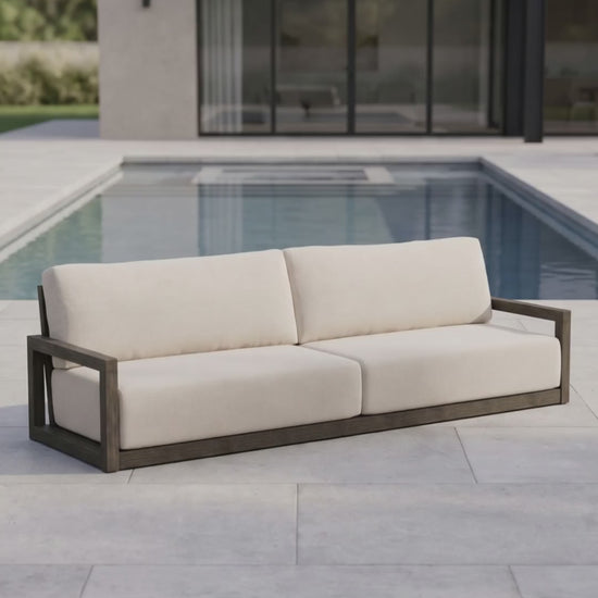 Paddy O' Furniture Frame 111-inch outdoor sofa with architectural lines and soft, durable Bliss fabric cushions.