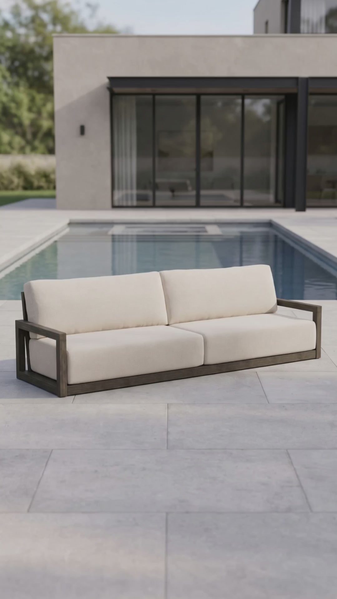 Paddy O' Furniture Frame 111-inch outdoor sofa with architectural lines and soft, durable Bliss fabric cushions.