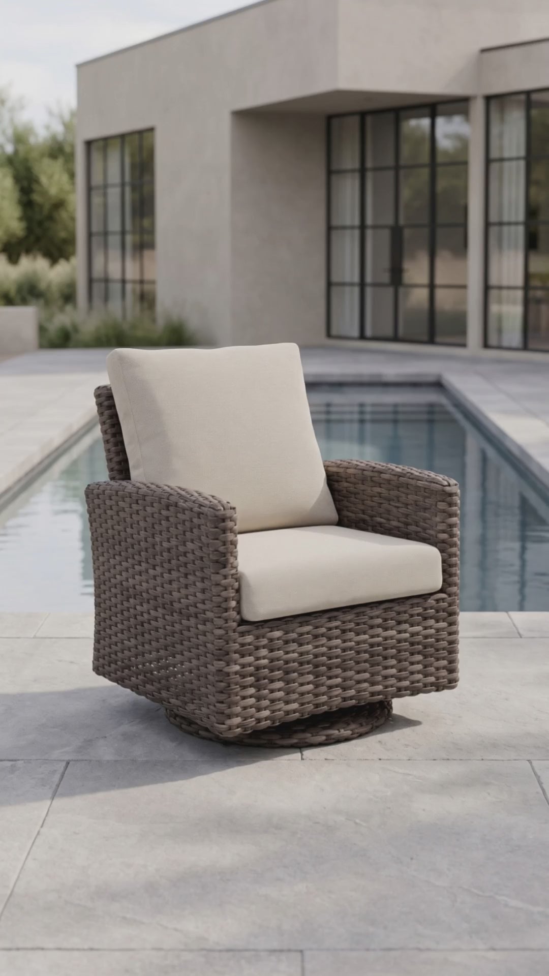 Malibu Club swivel chair with Bliss cushions on an outdoor patio, by Paddy O' Furniture.