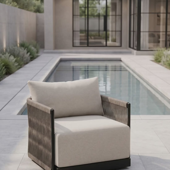Paddy O' Furniture Resort Club Chair featuring an elegant outdoor frame and comfortable Bliss cushions.