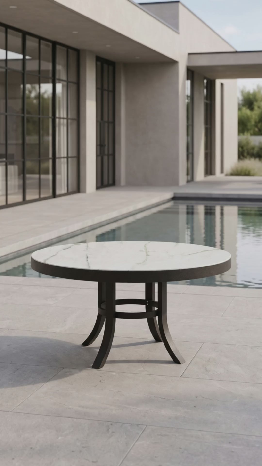 Round outdoor coffee table centerpiece with a sturdy base and smooth top by Paddy O' Furniture