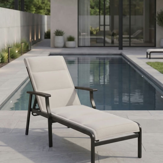 Paddy O' Furniture Newport padded sling chaise lounge for luxury outdoor living.