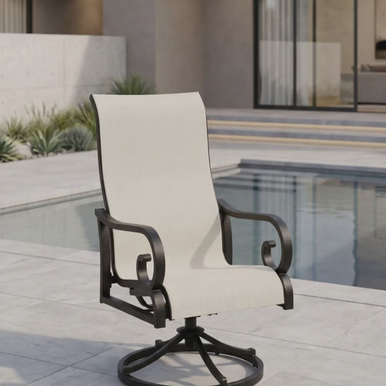 a traditional sling outdoor dining chair with scrolled arms
