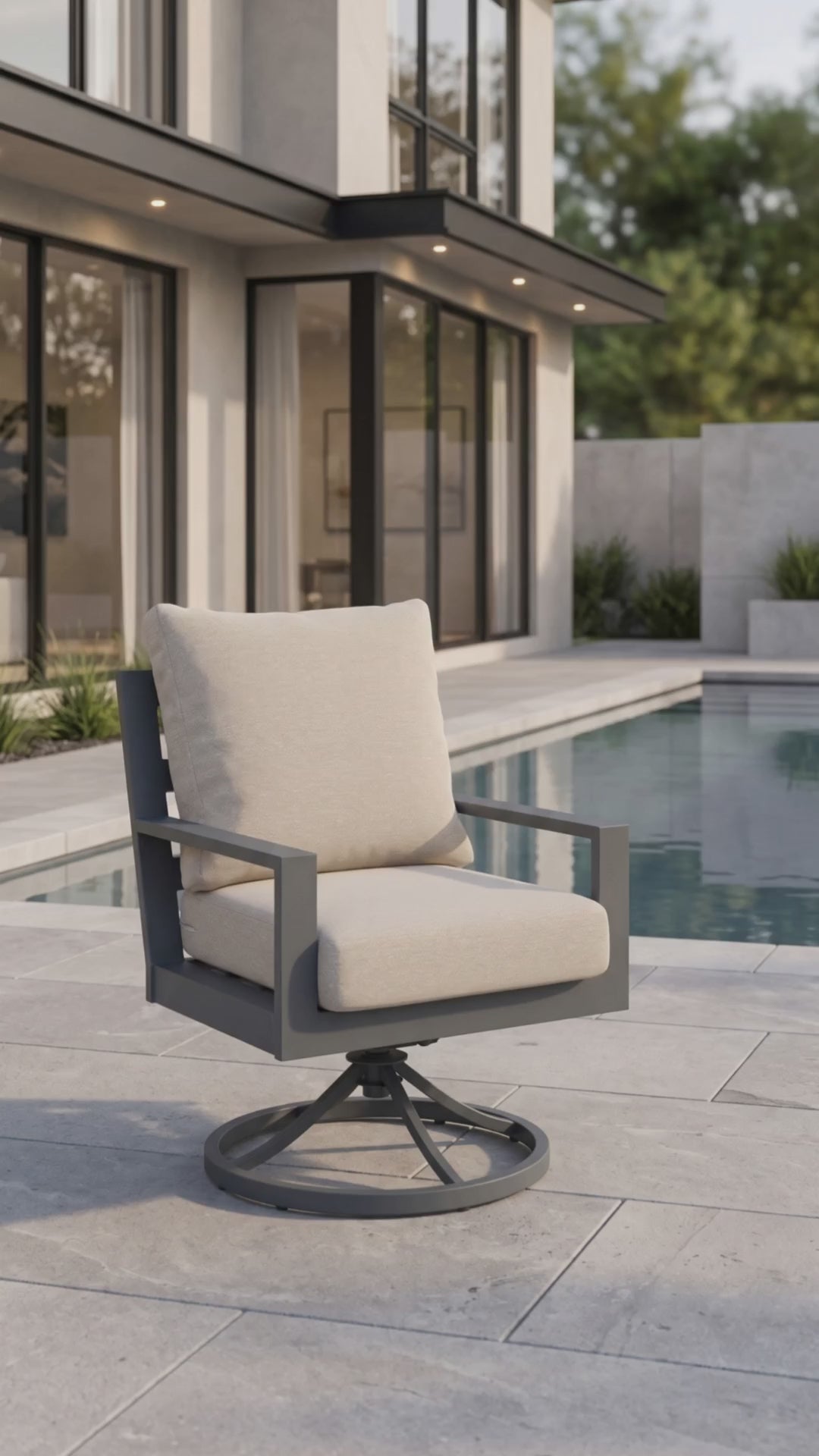 Peninsula swivel outdoor dining chair with gray aluminum frame, 360-degree swivel base, and beige weather-resistant cushions