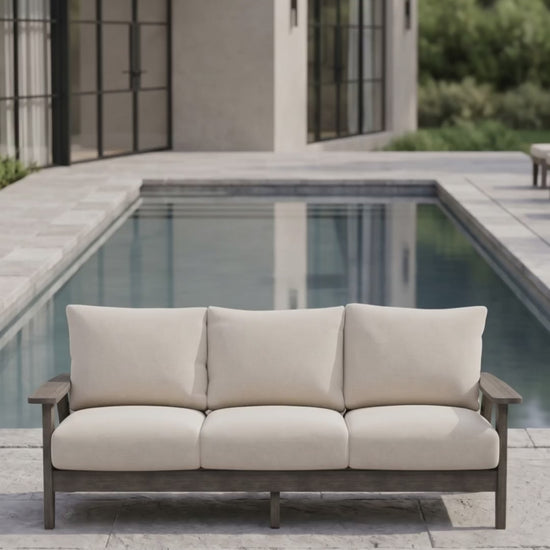 Paddy O' Furniture Patriot outdoor sofa featuring deep Bliss cushions.