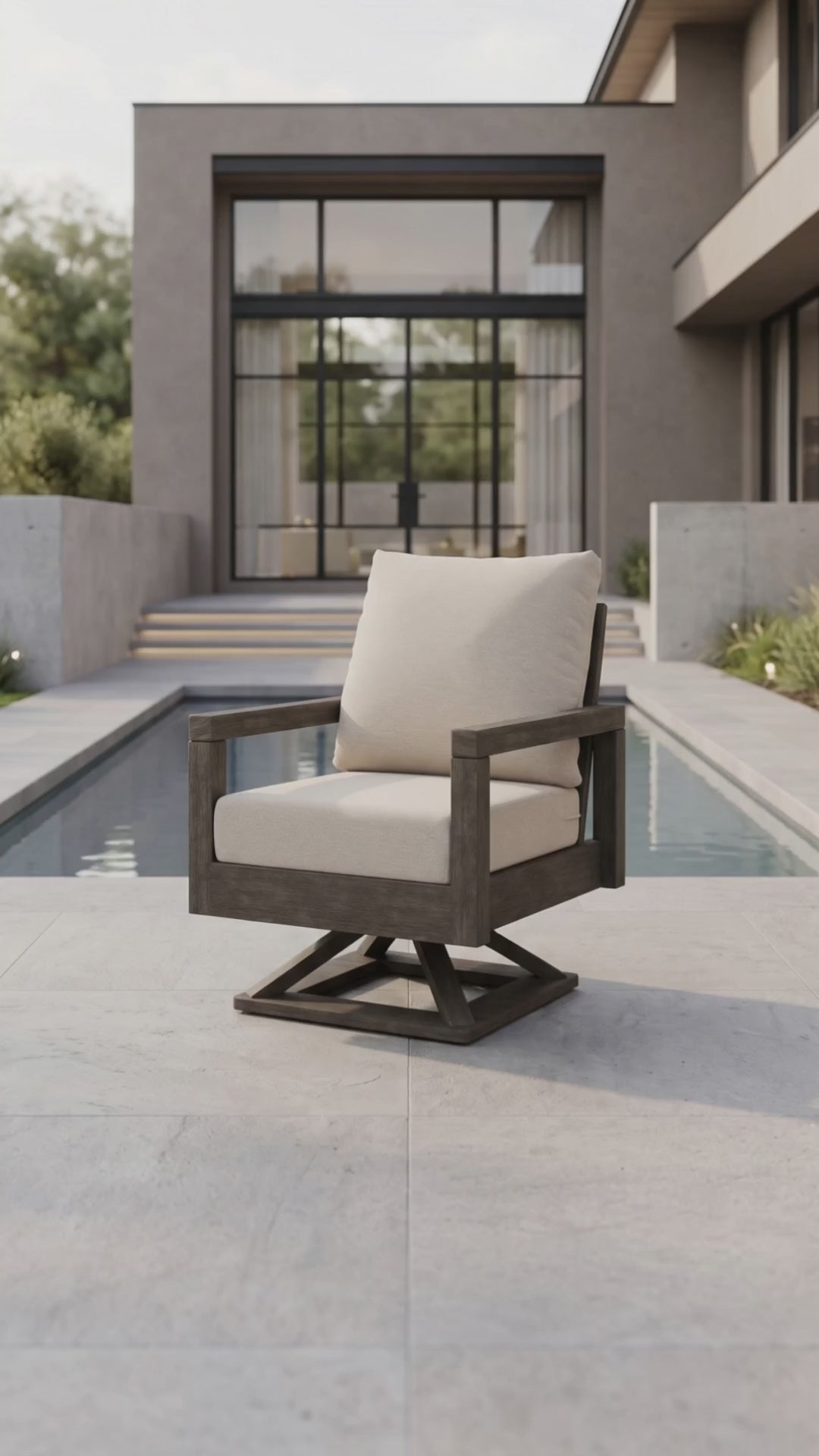 Paddy O' Furniture Lakeside Club swivel chair with Bliss cushions outdoors.