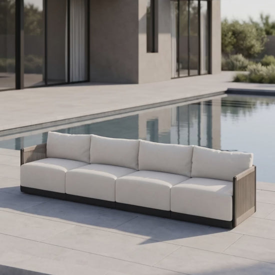 Paddy O' Furniture Resort 4-Seat Outdoor Sofa with plush cushions on a patio.