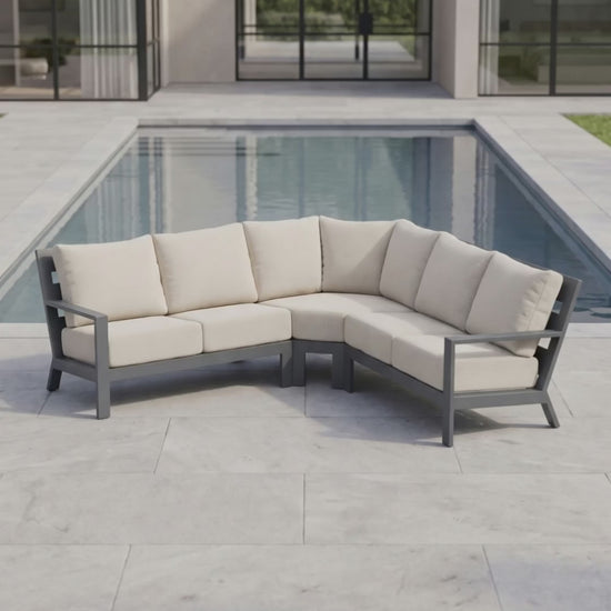 Paddy O' Furniture Peninsula 5-seat sectional outdoor sofa set with plush Bliss cushions on a patio.