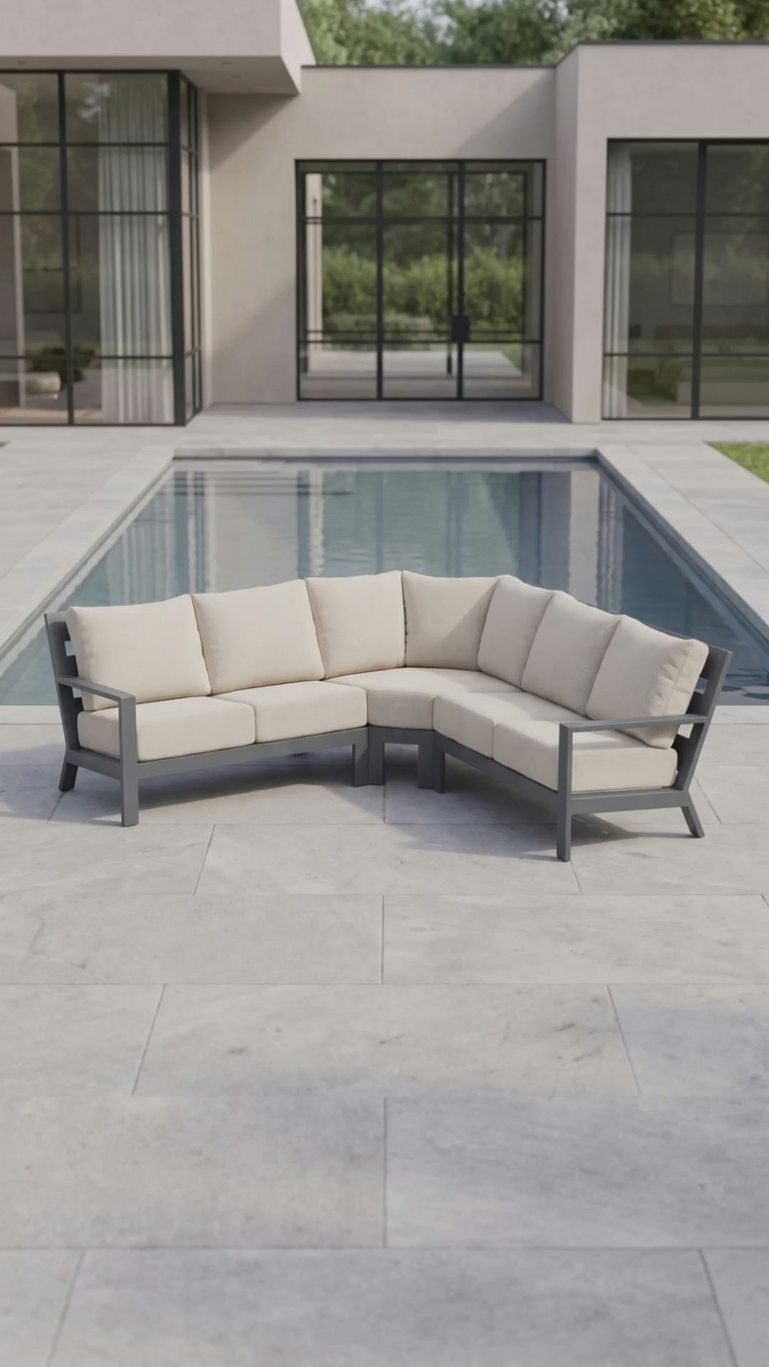 Paddy O' Furniture Peninsula 5-seat sectional outdoor sofa set with plush Bliss cushions on a patio.
