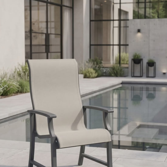 A modern Rockport Sling dining chair featuring a breathable mesh surface on a clean, elegant frame.