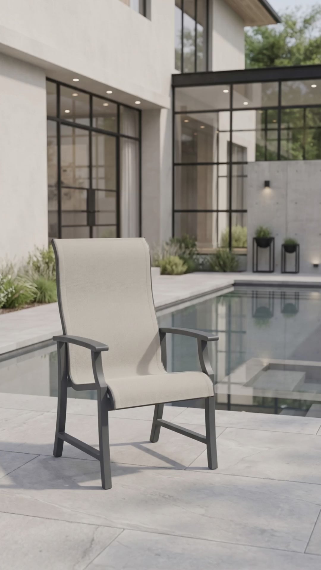 A modern Rockport Sling dining chair featuring a breathable mesh surface on a clean, elegant frame.