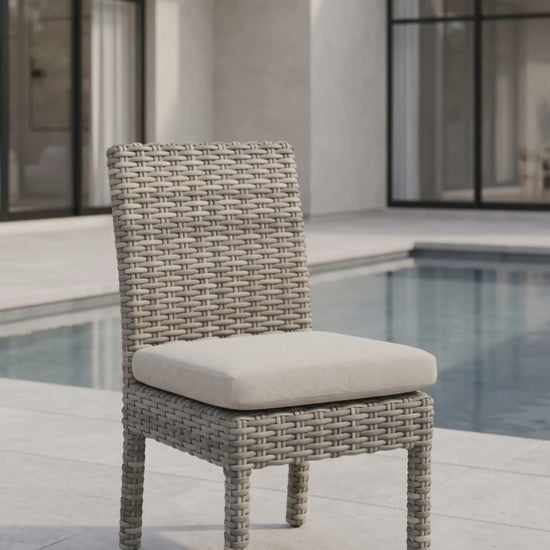 Loire Valley outdoor dining side chair with all-weather wicker frame and beige weather-resistant seat cushion