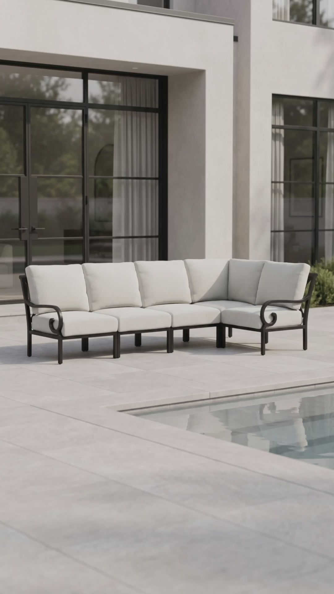 Paddy O' Furniture Rancho 5-seat L-shaped outdoor sectional with Bliss cushions in an open-air living room.
