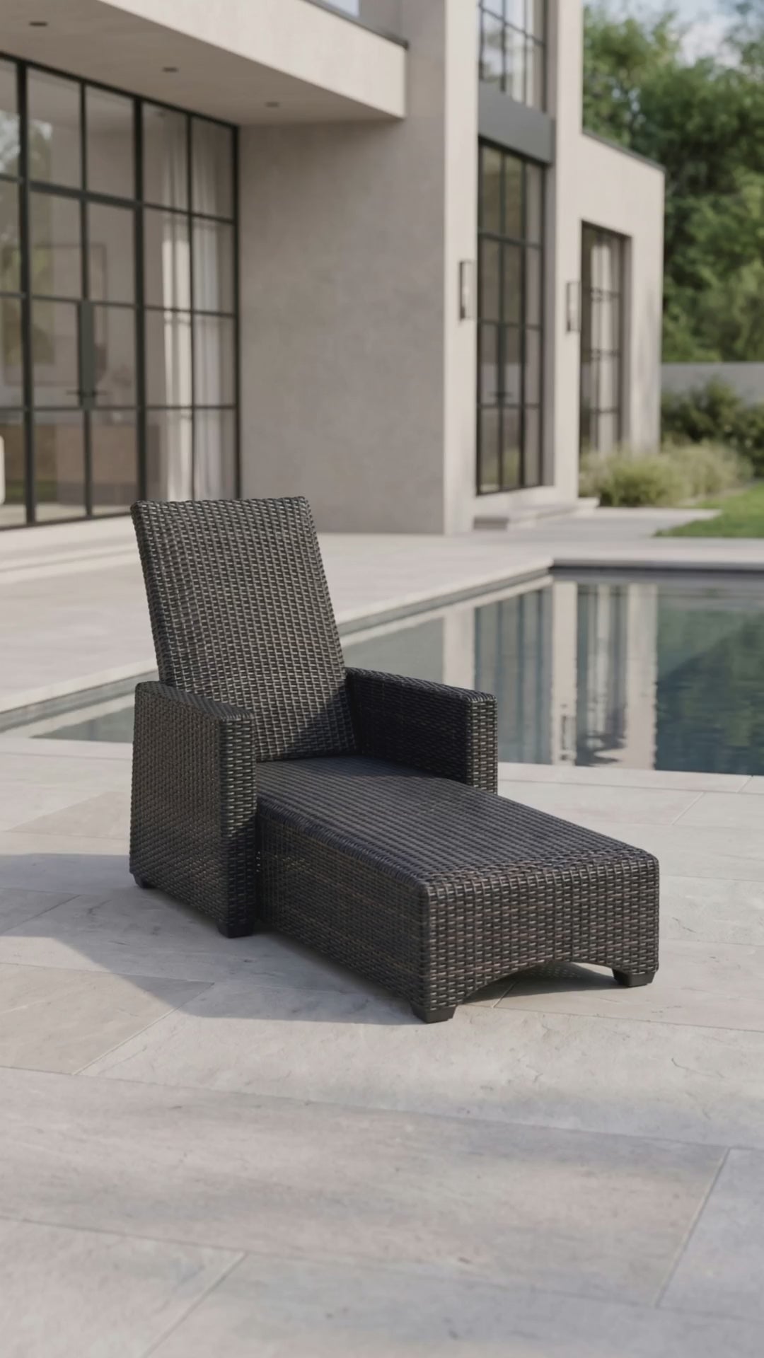 Paddy O' Furniture Ventura woven chaise lounge with an integrated cushioned seat for outdoor relaxation.