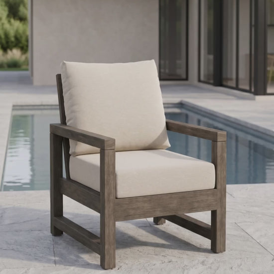 Premium outdoor Lakeside Club Chair featuring tailored upholstery and comfortable Bliss cushions by Paddy