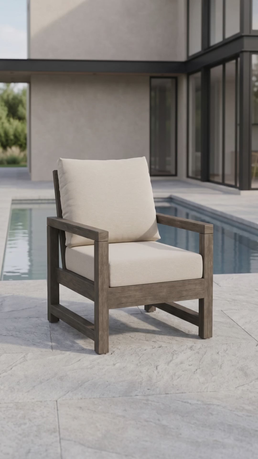 Premium outdoor Lakeside Club Chair featuring tailored upholstery and comfortable Bliss cushions by Paddy