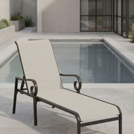 Paddy O' Furniture Rancho Sling Chaise Lounge with a sleek frame and breathable mesh sling surface for outdoor relaxation.