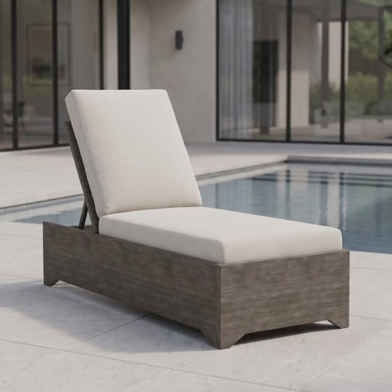 The modern Frame Chaise Lounge by Paddy O' Furniture features Bliss cushions for comfortable outdoor relaxation.