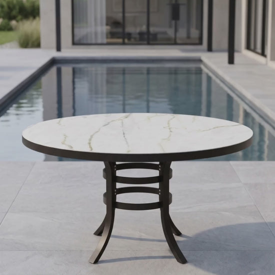 Sophisticated Paddy O' Furniture round patio dining table designed for outdoor entertaining and hosting.