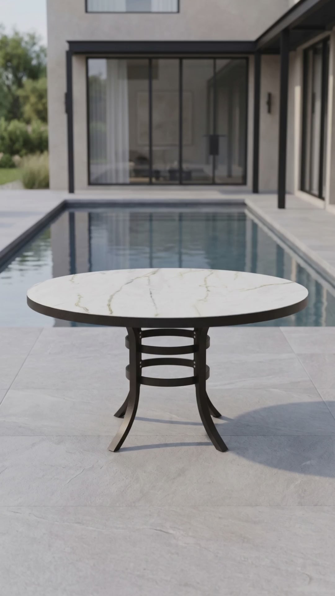 Sophisticated Paddy O' Furniture round patio dining table designed for outdoor entertaining and hosting.