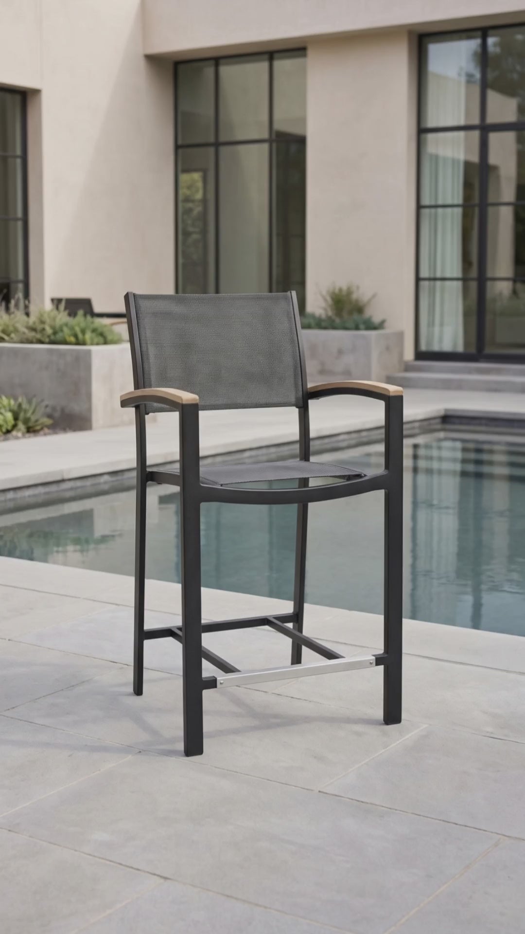 Paddy O' Furniture Mission Sling balcony chair featuring a modern frame and breathable mesh seat.